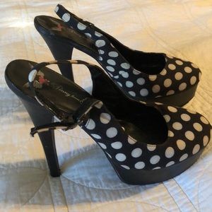 Penny loves Kenny high heel polka dot platforms.